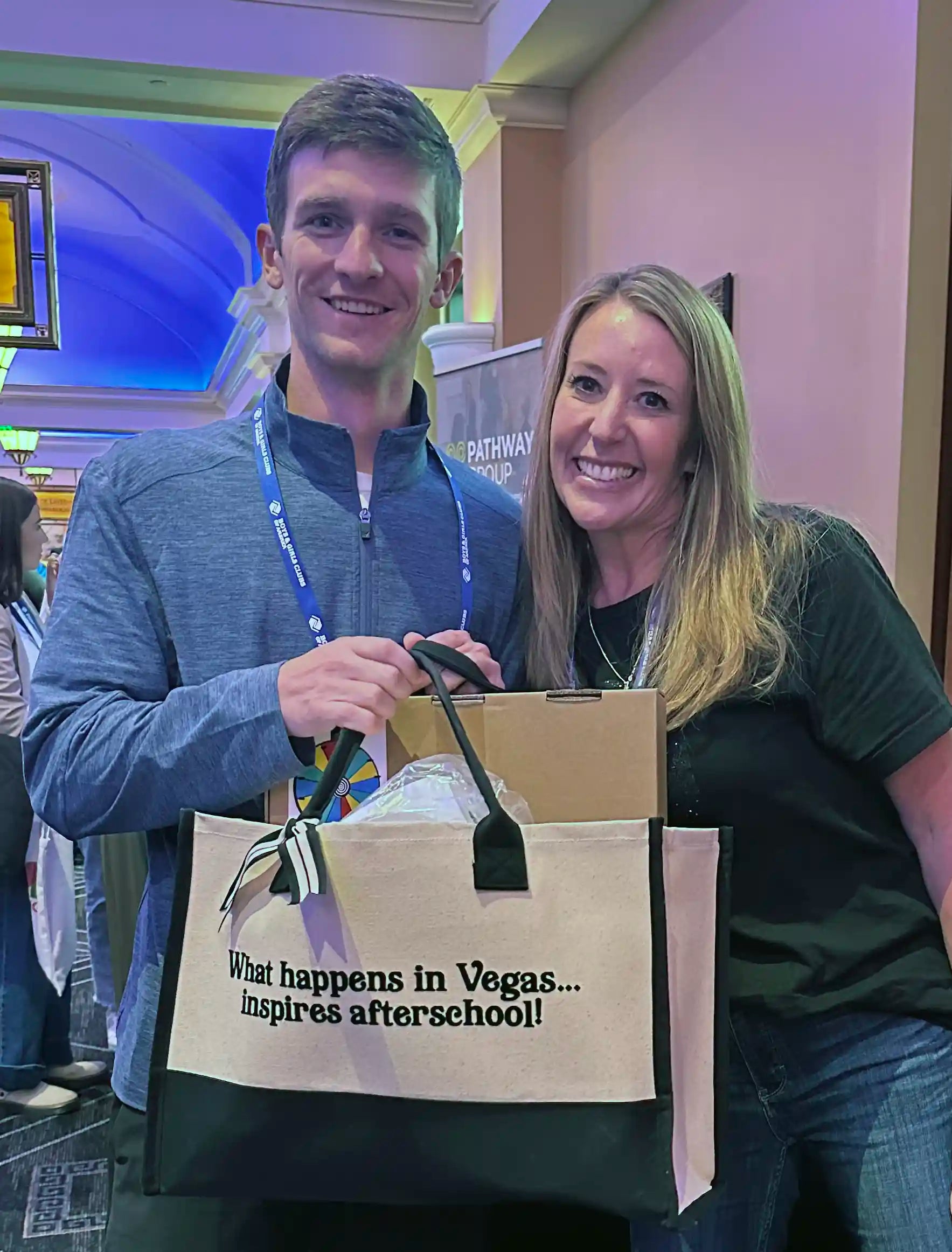 Raffle winner poses with the prize.