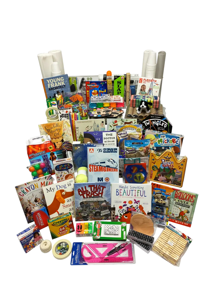 STEAMgineers kit filled with books, building tools, art supplies, and hands-on STEM activities for creative problem-solving.